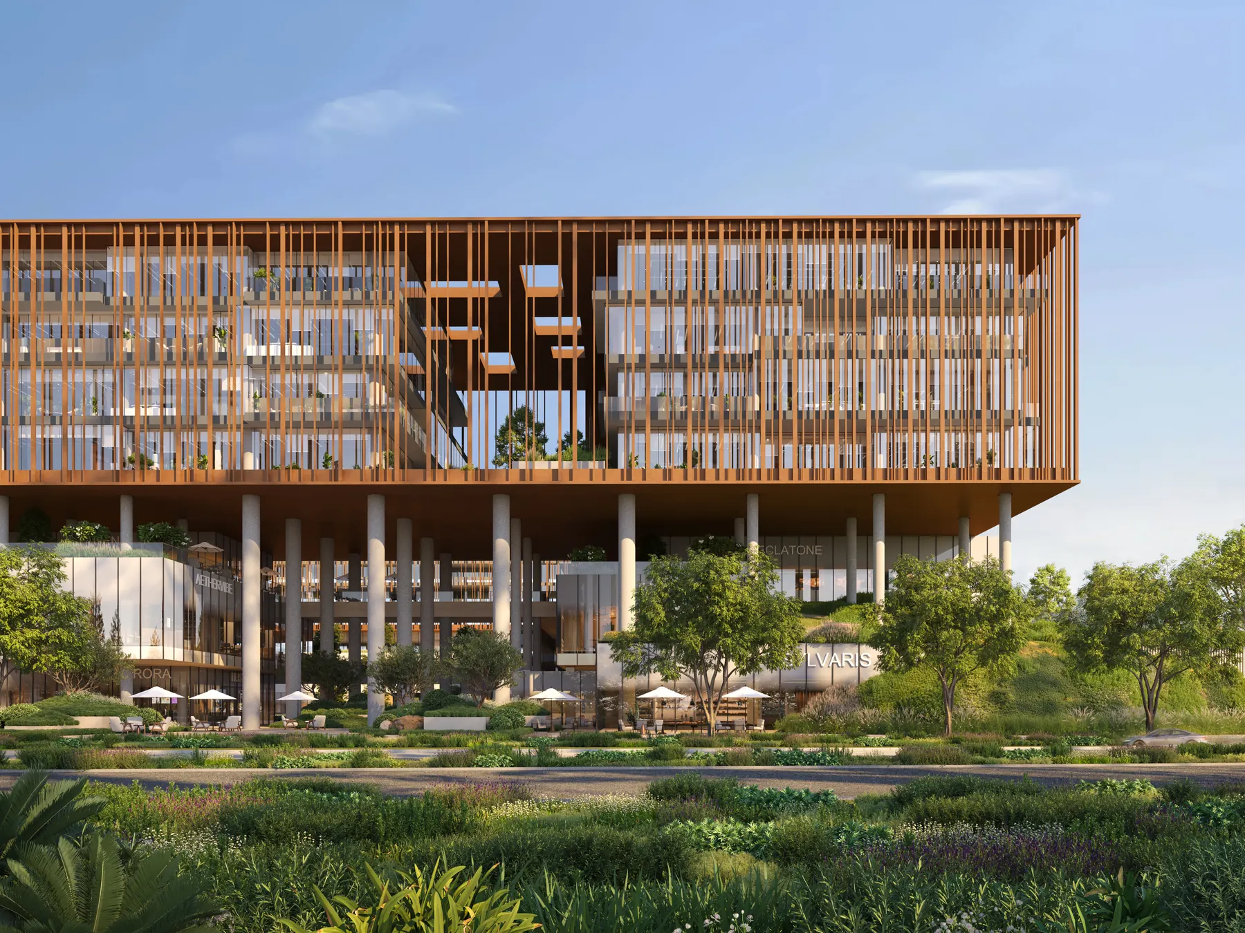 Close view of the façade: deep aluminium louvres and glass over a colonnade and planted terraces